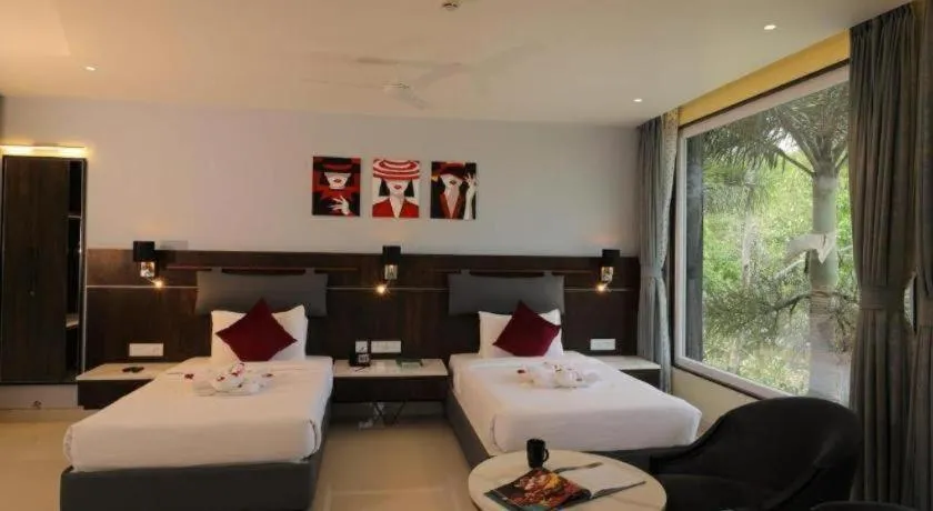 Bed in Pragati Green Meadows and Resort