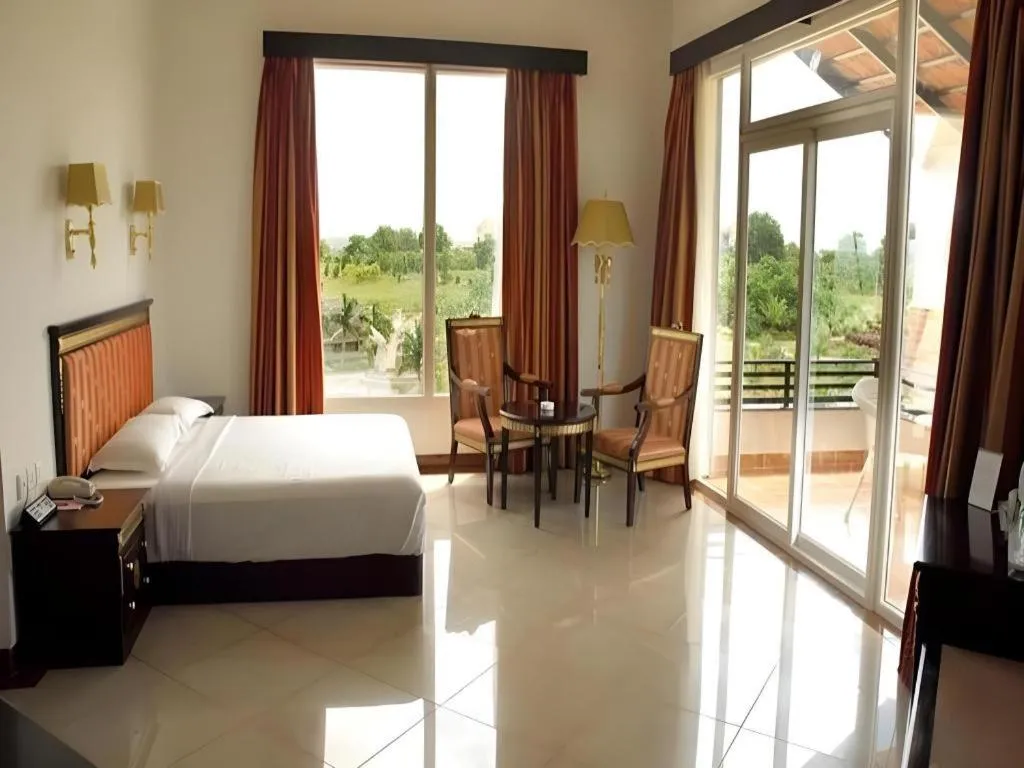 Bed in Pragati Green Meadows and Resort