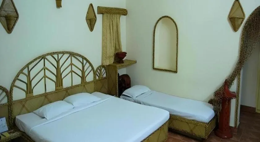 Bed in Pragati Green Meadows and Resort