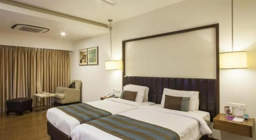 Bed in Hotel Minerva Grand