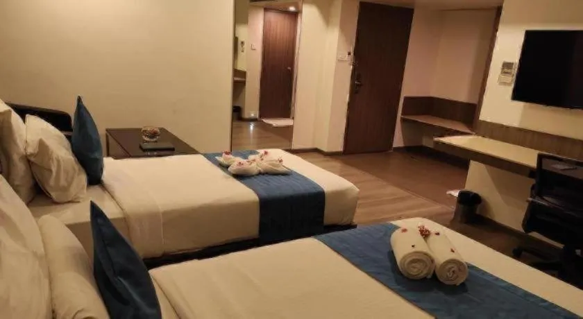 Bed in Hotel Minerva Grand