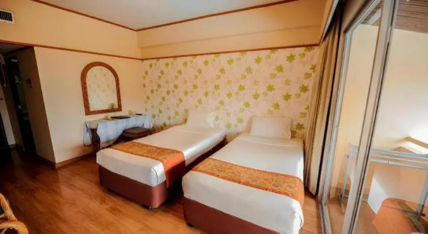 Bed in Haad Kaew Resort Songkhla