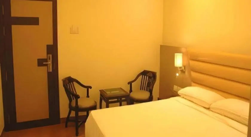 Bed in Hotel J.S. Residency