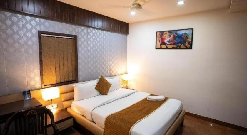 Bed in Hotel J.S. Residency