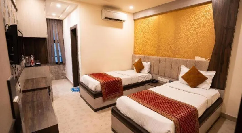 Bed in Hotel J.S. Residency