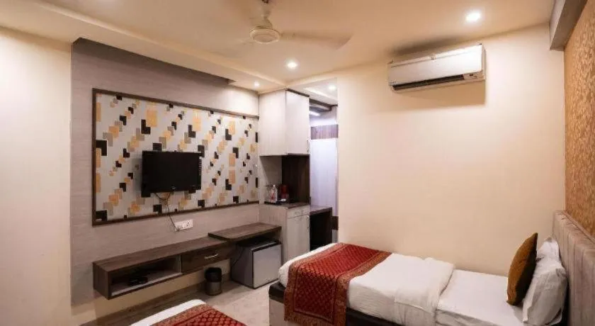 Bed in Hotel J.S. Residency