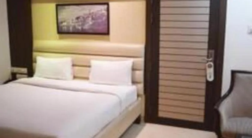 Bed in Hotel J.S. Residency