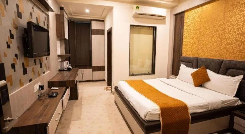 Bed in Hotel J.S. Residency