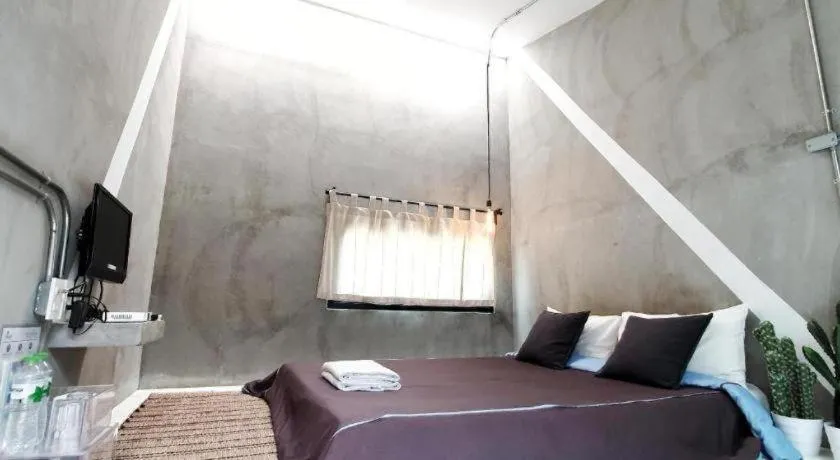 Bed in PAUSE Resort & Bar