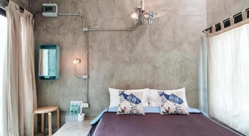 Bed in PAUSE Resort & Bar