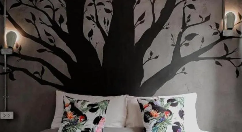 Bed in PAUSE Resort & Bar