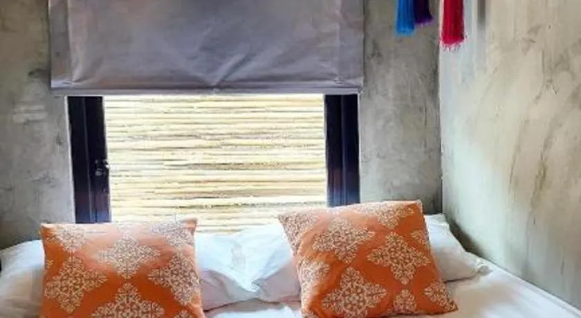 Bed in PAUSE Resort & Bar