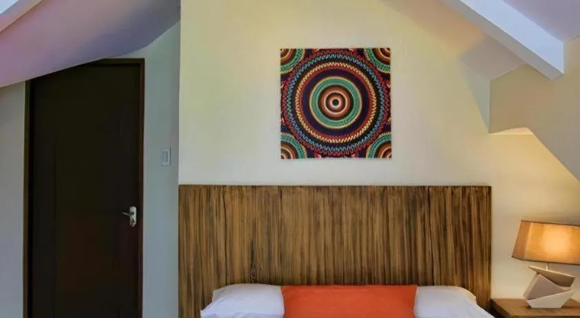 Bed in Batis Aramin Resort And Hotel Corp.