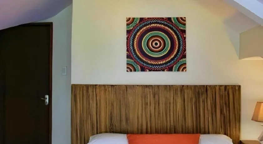 Bed in Batis Aramin Resort And Hotel Corp.