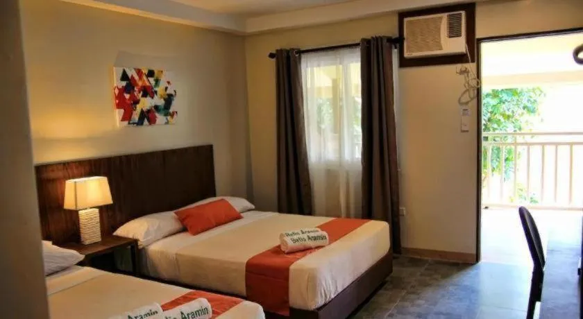 Bed in Batis Aramin Resort And Hotel Corp.