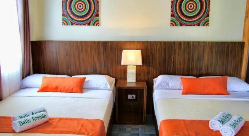 Bed in Batis Aramin Resort And Hotel Corp.