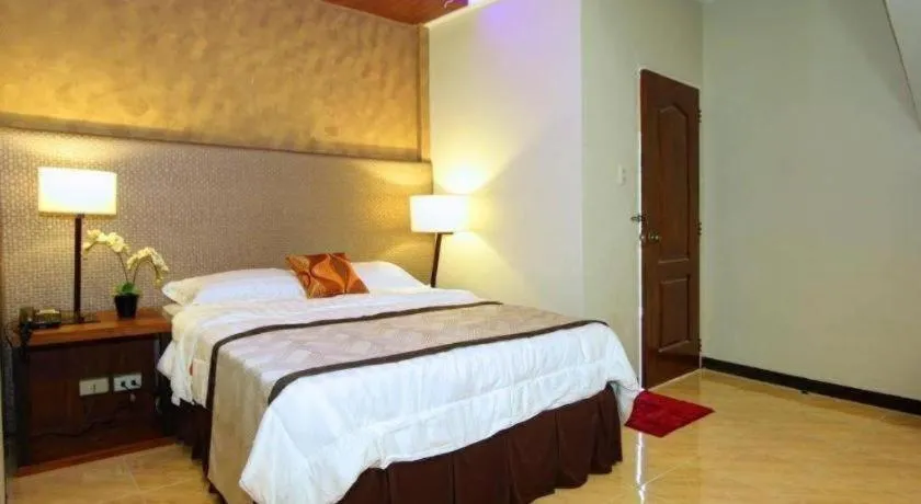 Bed in Batis Aramin Resort And Hotel Corp.