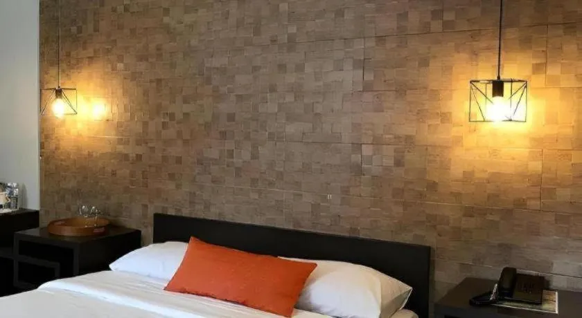 Bed in Batis Aramin Resort And Hotel Corp.