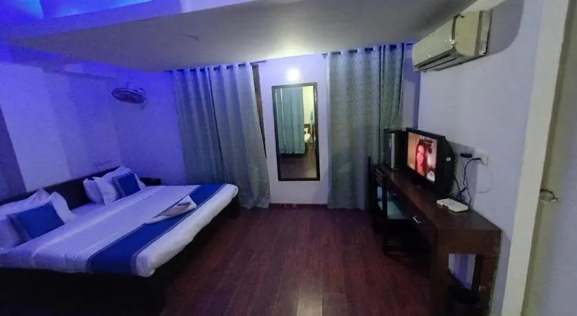 Bed in Hotel Laxmi Villa Palace