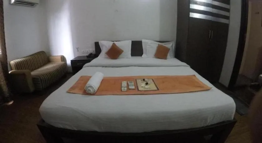 Bed in Hotel Laxmi Villa Palace