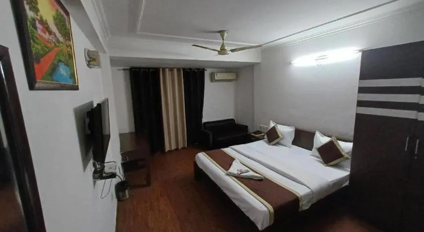 Bed in Hotel Laxmi Villa Palace