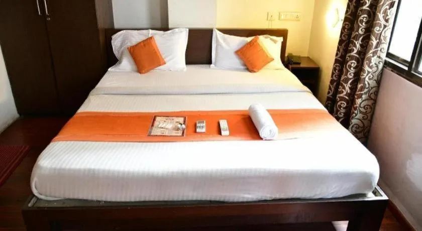 Bed in Hotel Laxmi Villa Palace