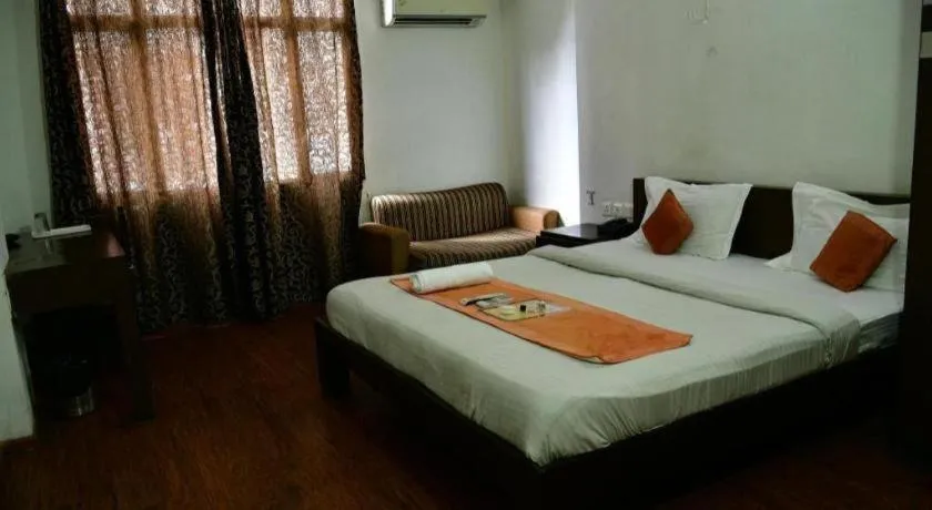 Bed in Hotel Laxmi Villa Palace