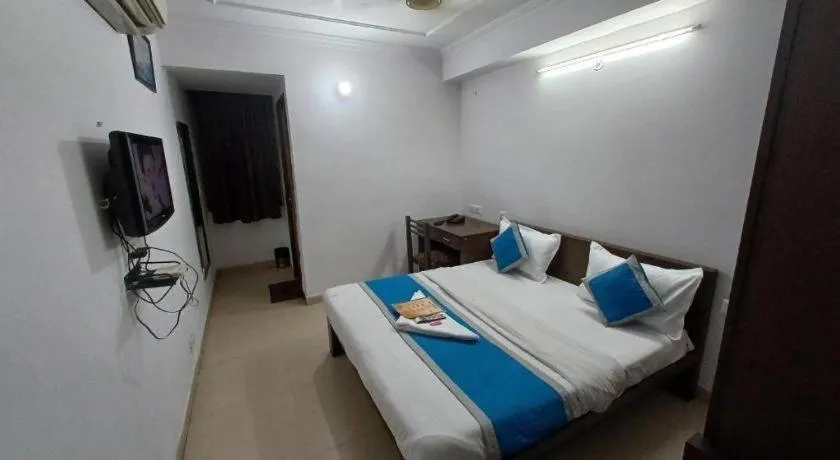 Bed in Hotel Laxmi Villa Palace