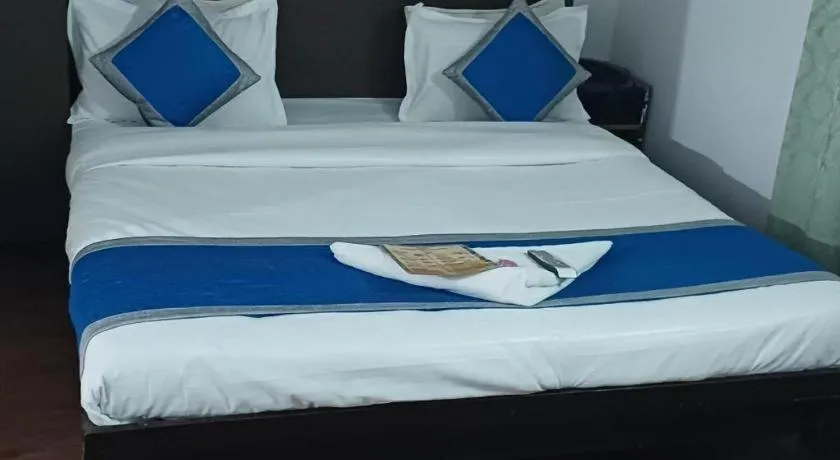 Bed in Hotel Laxmi Villa Palace