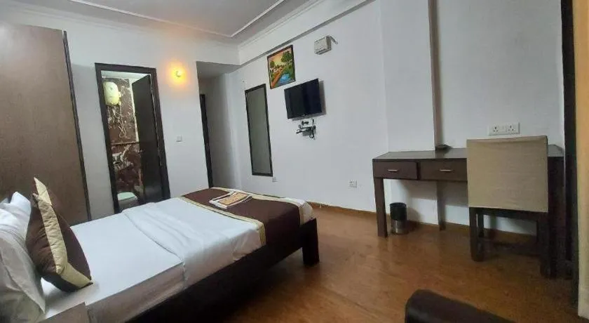 Bed in Hotel Laxmi Villa Palace