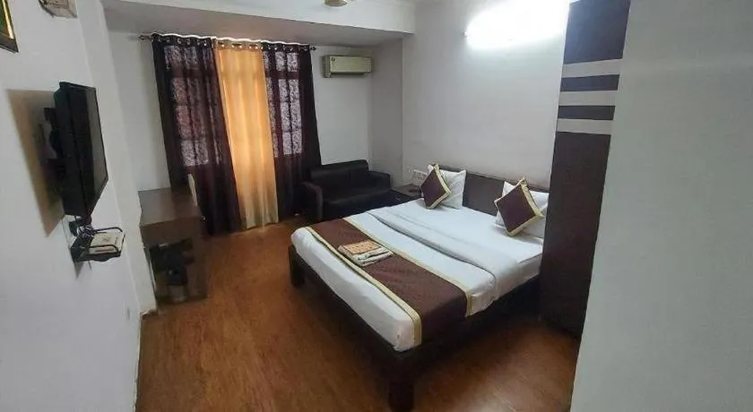 Bed in Hotel Laxmi Villa Palace