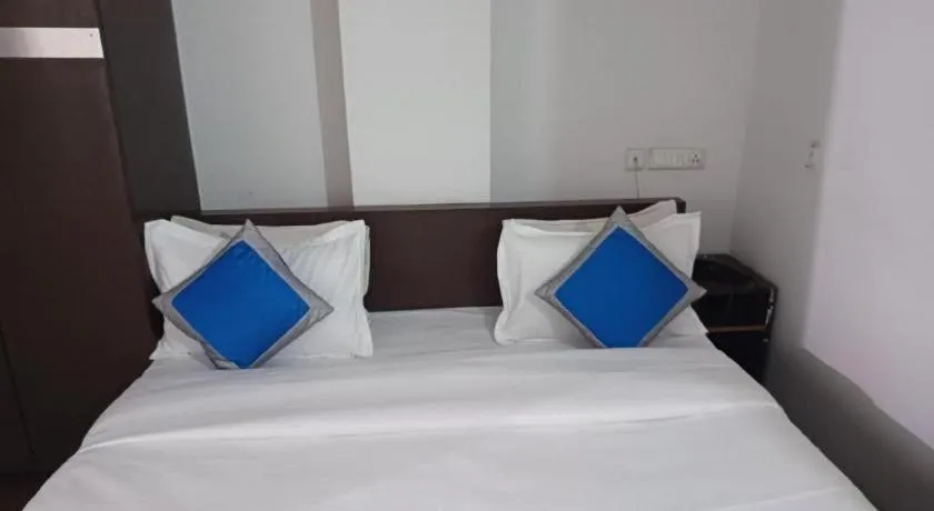 Bed in Hotel Laxmi Villa Palace