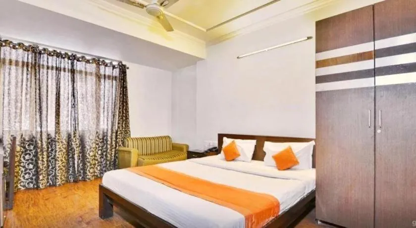 Bed in Hotel Laxmi Villa Palace