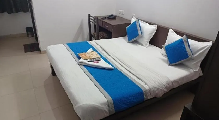 Bed in Hotel Laxmi Villa Palace