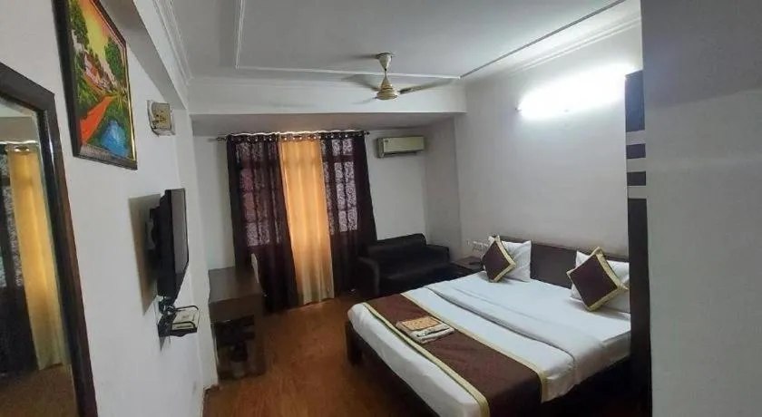 Bed in Hotel Laxmi Villa Palace