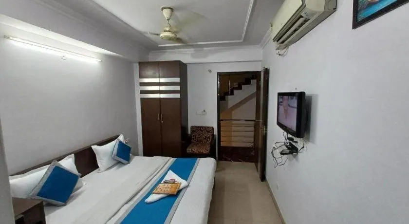 Bed in Hotel Laxmi Villa Palace