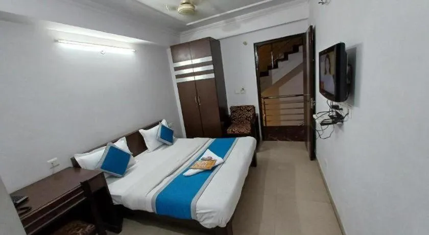 Bed in Hotel Laxmi Villa Palace