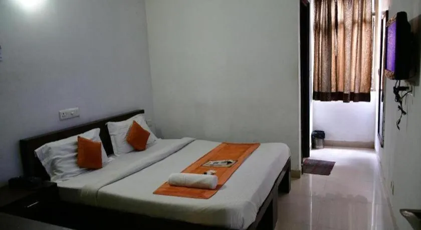 Bed in Hotel Laxmi Villa Palace