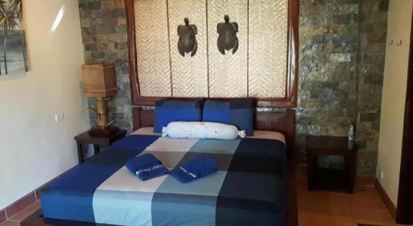 Bed in Treasure Island Beach Bungalows