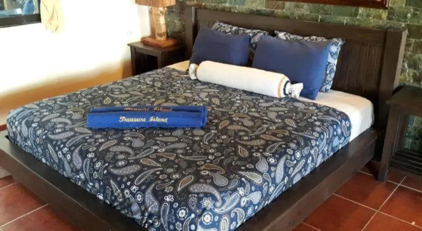 Bed in Treasure Island Beach Bungalows