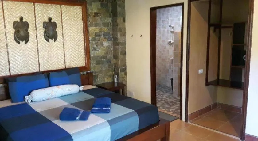 Bed in Treasure Island Beach Bungalows