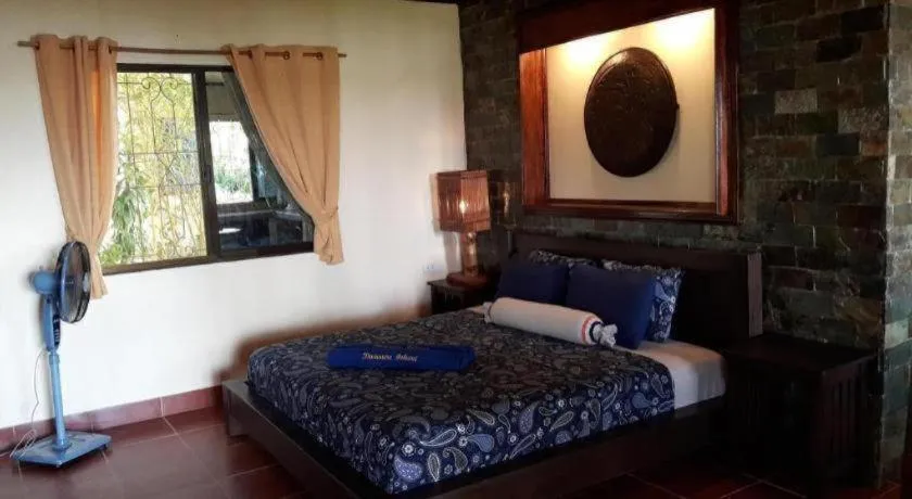 Bed in Treasure Island Beach Bungalows