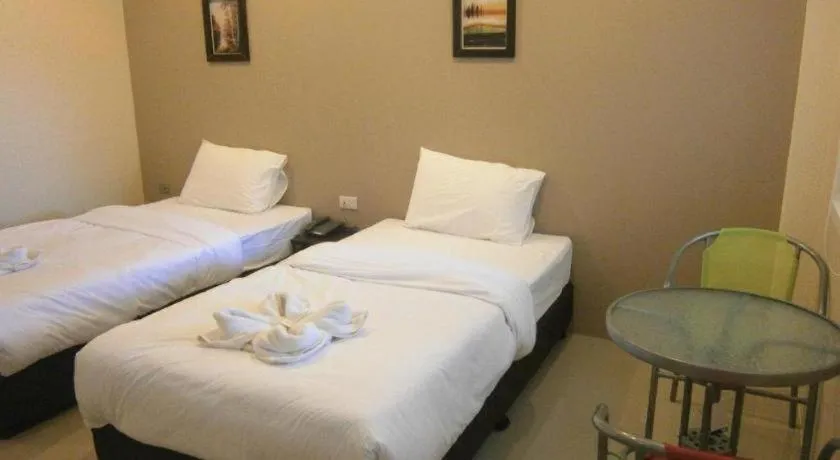 Bed in Surintara Resort