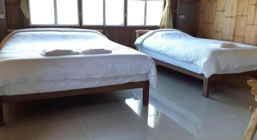 Bed in Maan Mek Talay Mok Resort