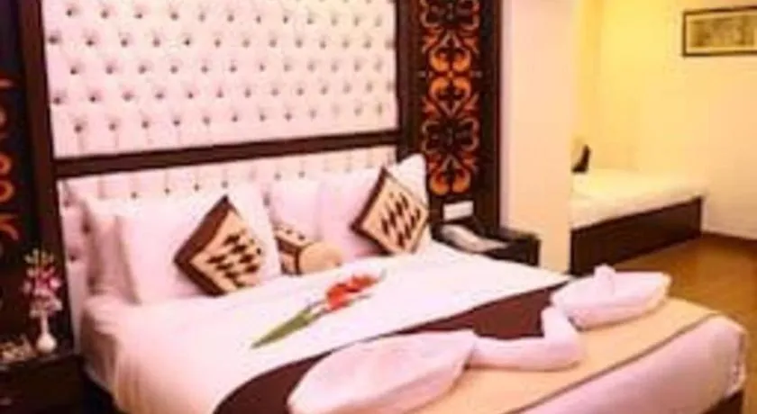 Bed in The Pearl Grand Hotel