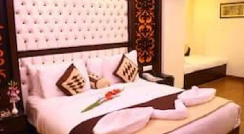 Bed in The Pearl Grand Hotel