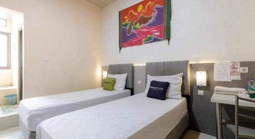 Bed in Urbanview Hotel Delima 101 Syariah