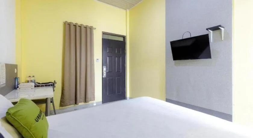 Bed in Urbanview Hotel Delima 101 Syariah