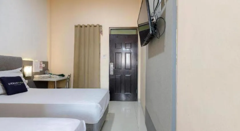 Bed in Urbanview Hotel Delima 101 Syariah