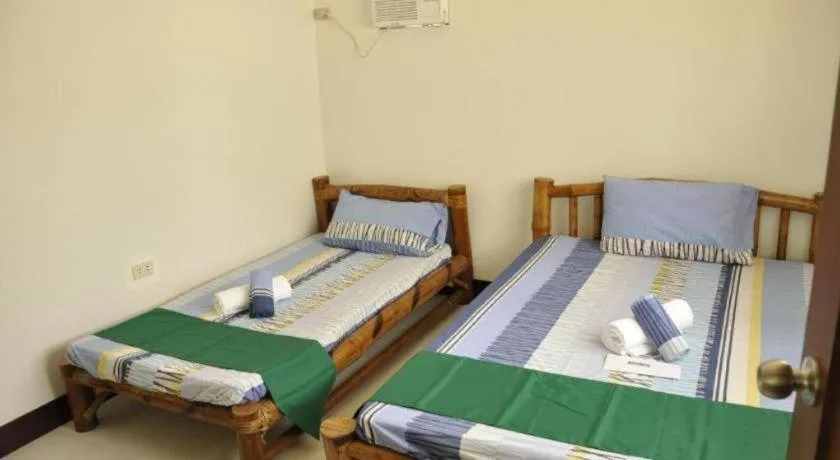 Bed in Paseo Verde Beach Resort